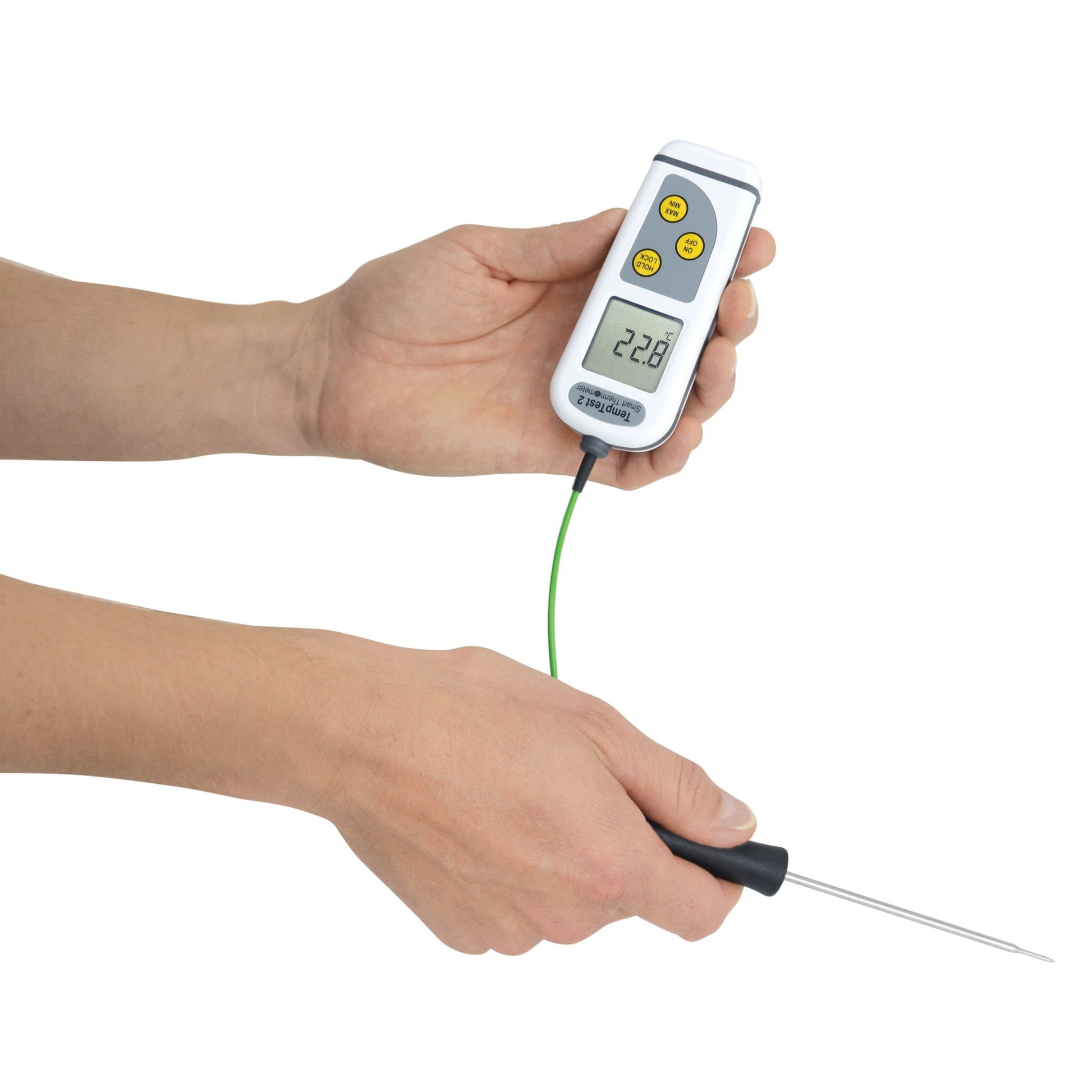 une personne tenant un Thermomètre intelligent Tempest 2 avec affichage rotatif de Thermometre.fr.