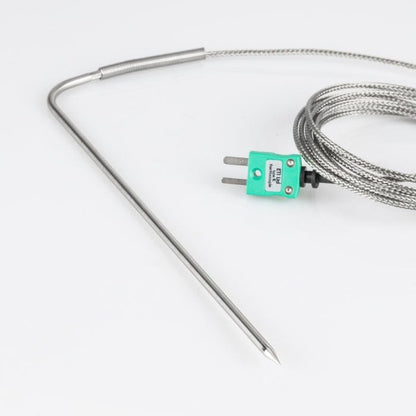 Un thermomètre Thermomètre.fr auquel est attachée une Sonde de pénétration de type (K/T) et un câble de type (Tressé/Blindé) pour mesurer la température.