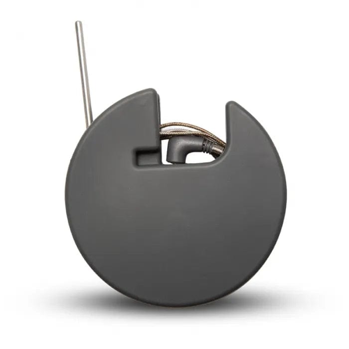 une Coque de rangement pour sondes DOT et ChefAlarm circulaire noire avec un fil qui y est attaché.