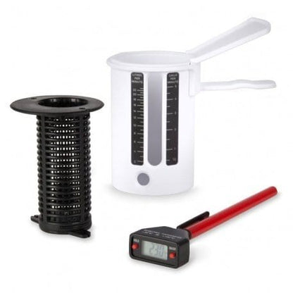 un set de cuisine noir et blanc avec un thermomètre digital Thermometre.fr et un thermomètre digital Thermometre.fr.